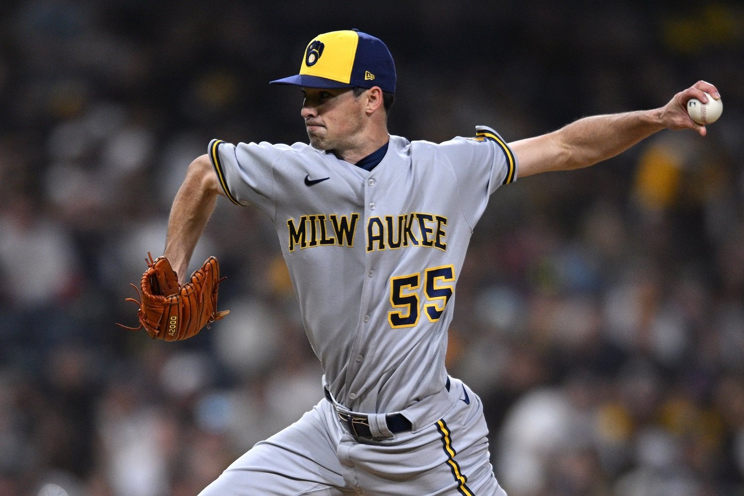 Hoby Milner of the Milwaukee Brewers throws during a baseball game