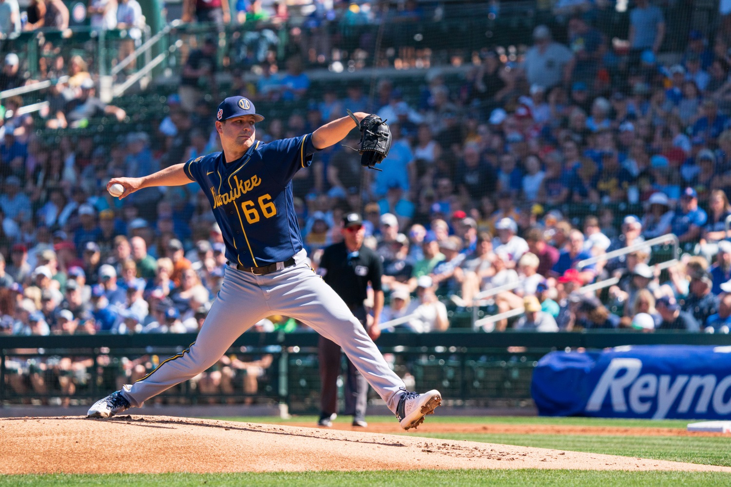 Milwaukee Brewers' Freddy Peralta poses for a picture with a