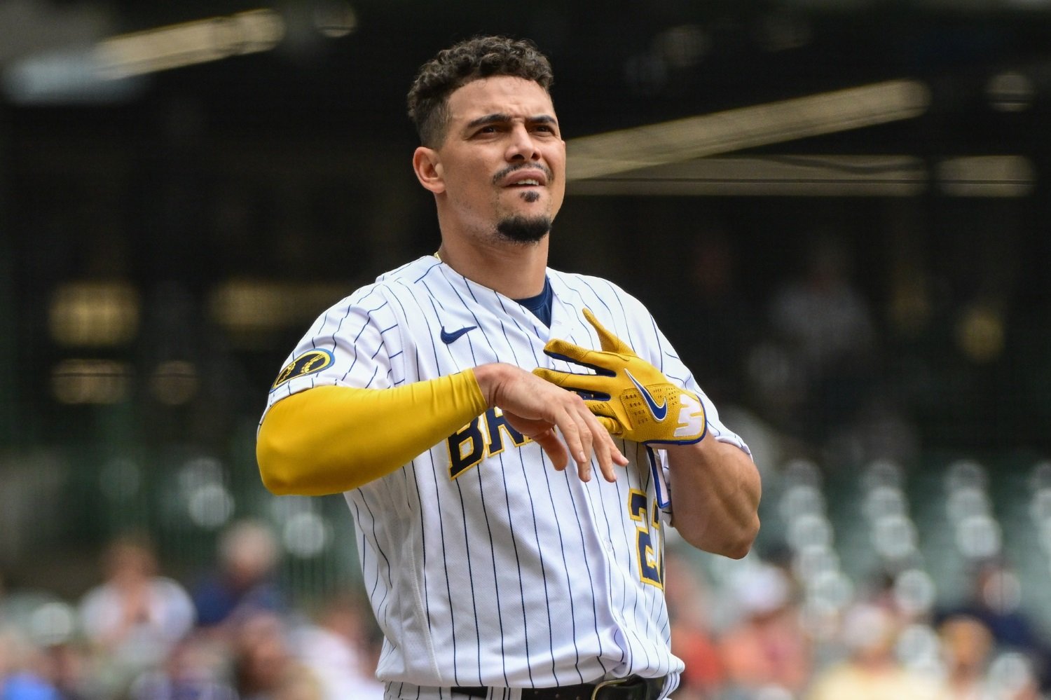 Brewers SS Willy Adames leaves game after getting hit by foul ball while in  dugout